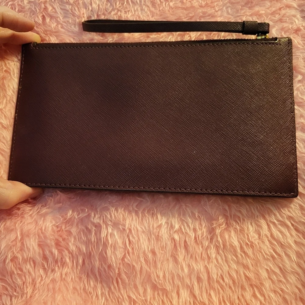 KATE SPADE LARGE WRISTLET WINE COLOR EUC